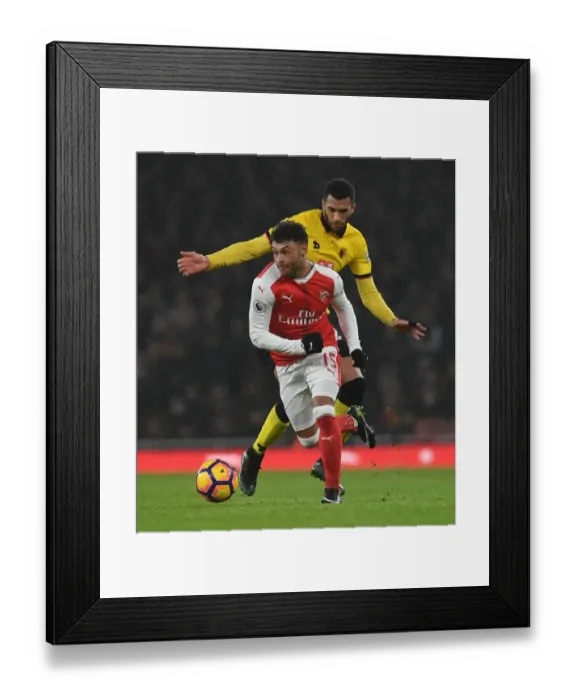 Framed Print : Arsenal vs. Watford: Oxlade-Chamberlain vs. Capoue Clash in Premier League Showdown Framed Print : Arsenal vs. Watford: Oxlade-Chamberlain vs. Capoue Clash in Premier League Showdown