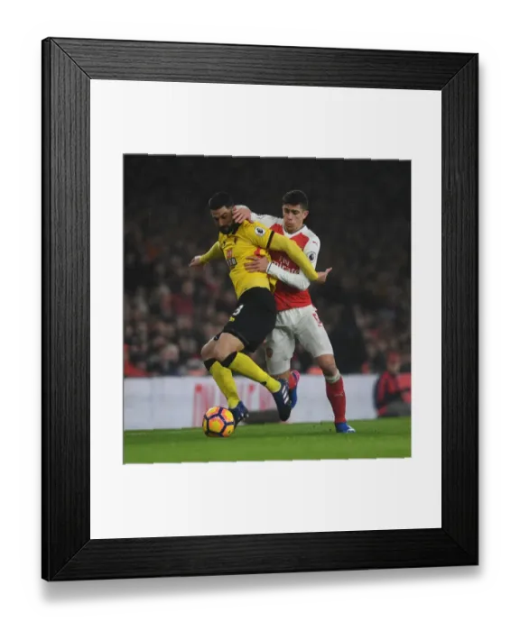Framed Print : Gabriel vs. Britos: A Premier League Showdown at Emirates Stadium Framed Print : Gabriel vs. Britos: A Premier League Showdown at Emirates Stadium