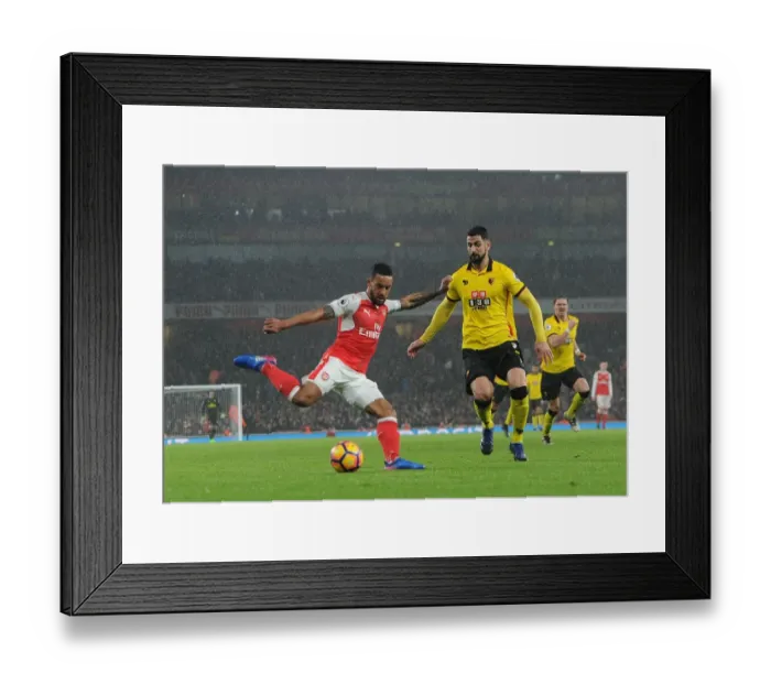 Framed Print : Arsenal's Theo Walcott Battles Past Watford's Miguel Britos in Premier League Clash Framed Print : Arsenal's Theo Walcott Battles Past Watford's Miguel Britos in Premier League Clash