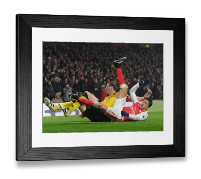 Framed Print : Arsenal vs. Watford: Alexis Sanchez Fouled by Sebastian Prodl during Premier League Clash Framed Print : Arsenal vs. Watford: Alexis Sanchez Fouled by Sebastian Prodl during Premier League Clash