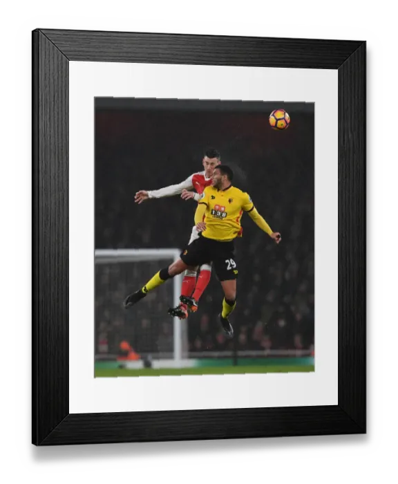 Framed Print : Arsenal vs. Watford: Koscielny Heads Off Pressure in Intense Premier League Clash Framed Print : Arsenal vs. Watford: Koscielny Heads Off Pressure in Intense Premier League Clash
