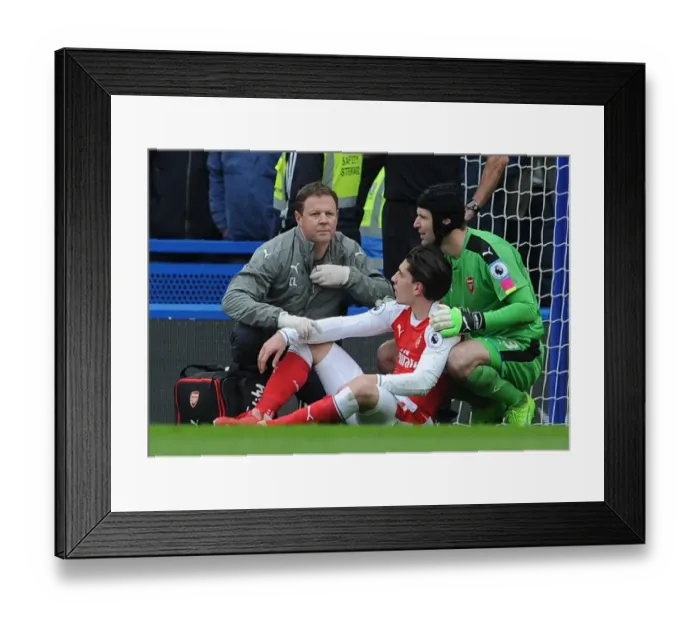 Framed Print : Arsenal: Hector Bellerin Receives Treatment from Petr Cech and Colin Lewin during Chelsea Match