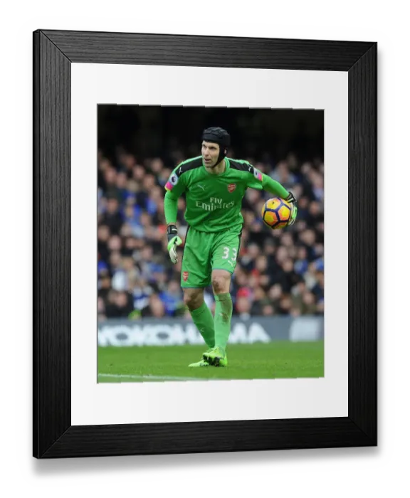 Framed Print : Petr Cech's Unwavering Focus: A Legendary Goalkeeper in the Chelsea vs. Arsenal Rivalry (2016-17)