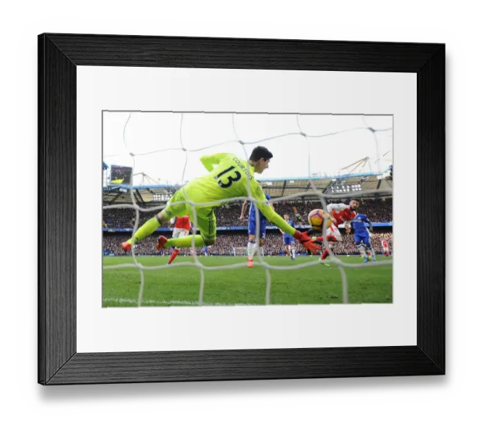 Framed Print : Giroud Stuns Chelsea: Olivier Scores Dramatic Goal Past Courtois in Premier League Clash