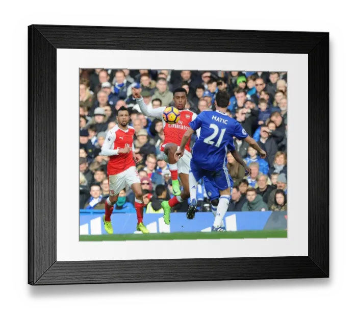 Framed Print : Clash of Midfield Titans: Iwobi vs. Matic in Chelsea vs. Arsenal Premier League Showdown