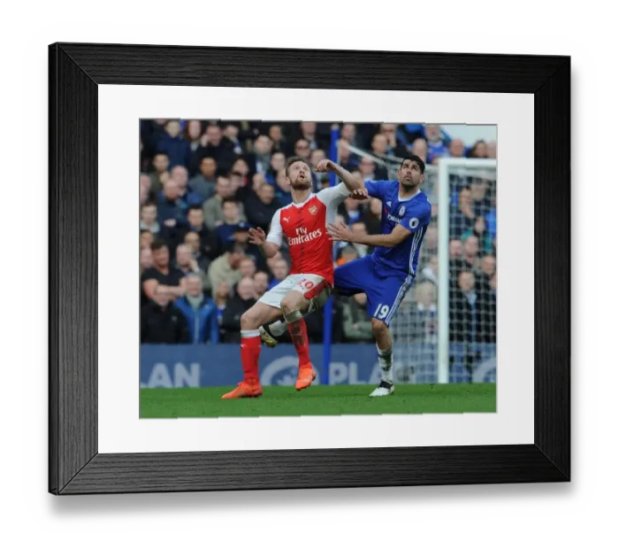 Framed Print : Mustafi vs Costa: Intense Clash Between Chelsea and Arsenal in Premier League Framed Print : Mustafi vs Costa: Intense Clash Between Chelsea and Arsenal in Premier League