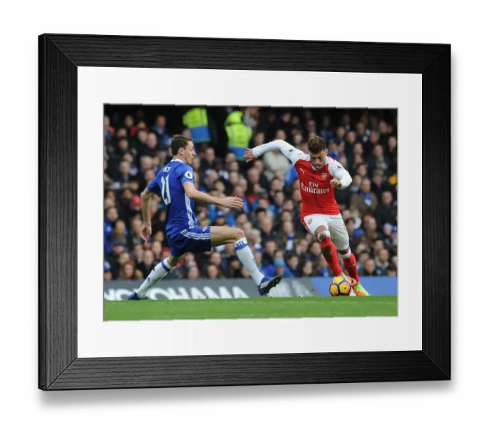 Framed Print : Clash of Midfield Titans: Oxlade-Chamberlain vs. Matic - Arsenal vs. Chelsea Rivalry Framed Print : Clash of Midfield Titans: Oxlade-Chamberlain vs. Matic - Arsenal vs. Chelsea Rivalry