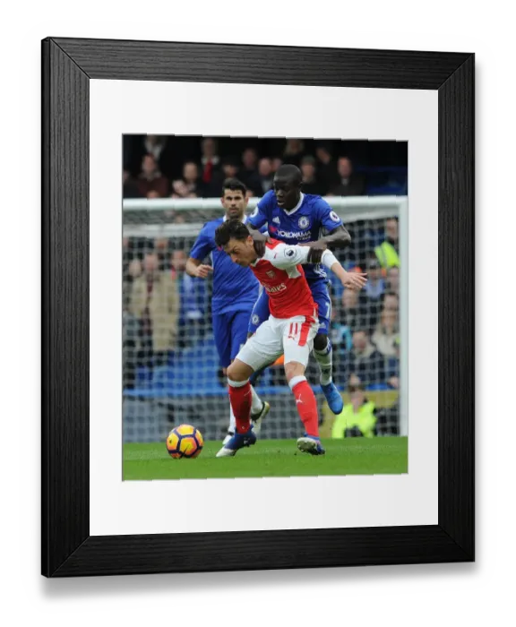 Framed Print : Mesut Ozil vs. N'Golo Kante: Battle at Stamford Bridge - Premier League Clash
