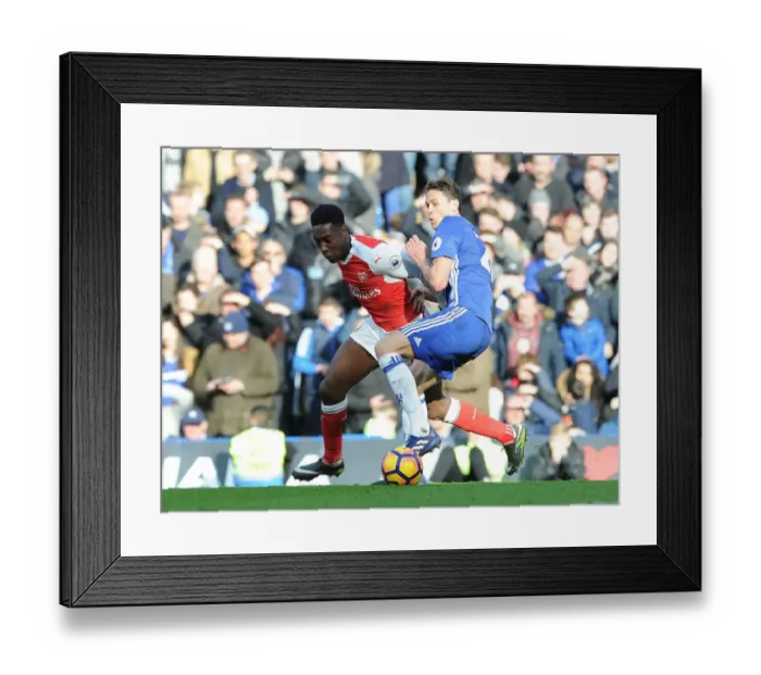 Framed Print : Danny Welbeck vs. Nemanja Matic: Battle at Stamford Bridge - Premier League Clash between Chelsea and Arsenal Framed Print : Danny Welbeck vs. Nemanja Matic: Battle at Stamford Bridge - Premier League Clash between Chelsea and Arsenal
