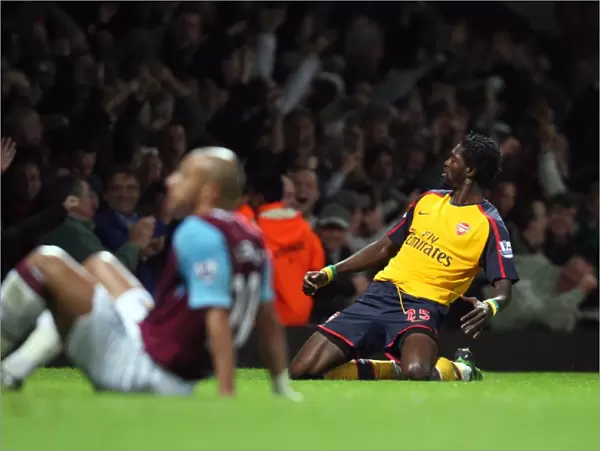 Emmanuel Adebayor celebrates Arsenals 1st goal