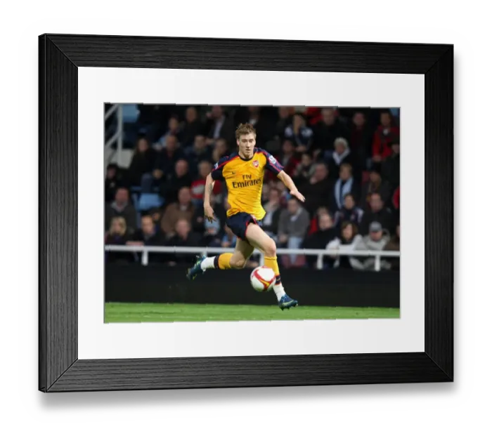Framed Print : Bendtner's Brilliant Performance: Arsenal Crush West Ham 2-0 in Premier League Framed Print : Bendtner's Brilliant Performance: Arsenal Crush West Ham 2-0 in Premier League