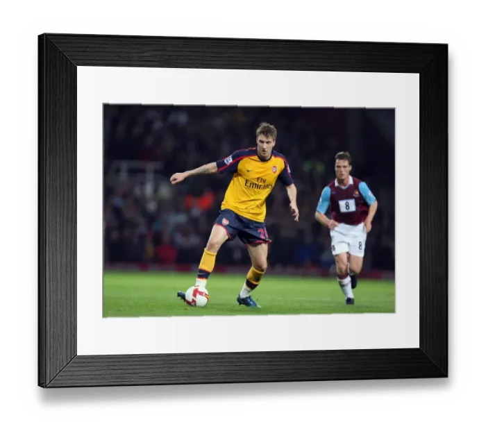 Framed Print : Bendtner's Brilliance: Arsenal's 2-0 Win Over West Ham in the Premier League Framed Print : Bendtner's Brilliance: Arsenal's 2-0 Win Over West Ham in the Premier League