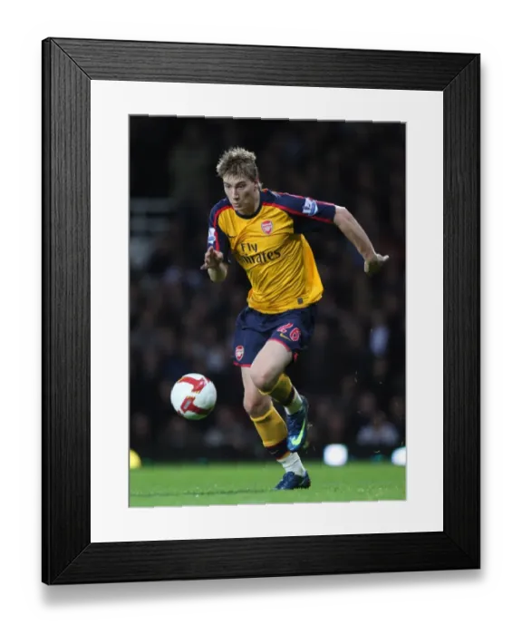 Framed Print : Bendtner's Brilliance: Arsenal's 2-0 Victory Over West Ham in the Premier League