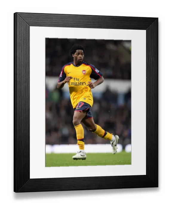 Framed Print : Alex Song's Brilliant Performance: Arsenal's 2-0 Victory Over West Ham in the Premier League