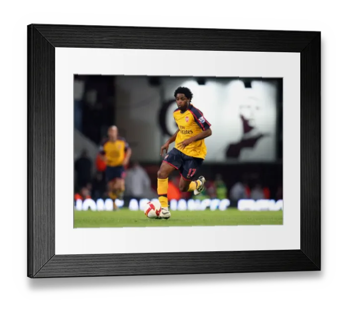 Framed Print : Alex Song's Brilliant Performance: Arsenal's Unforgettable 2-0 Victory Over West Ham in the Premier League Framed Print : Alex Song's Brilliant Performance: Arsenal's Unforgettable 2-0 Victory Over West Ham in the Premier League