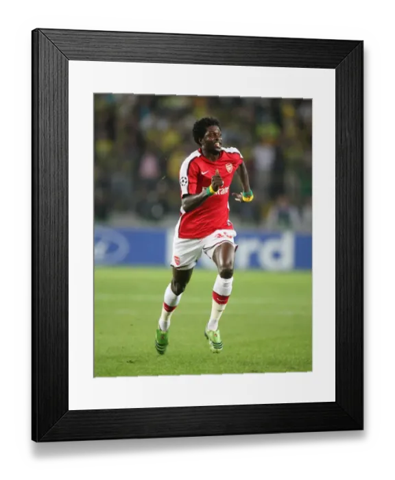 Framed Print : Adebayor's Brilliant 2 Goal Performance: Arsenal Crushes Fenerbahce 5-2 in Champions League