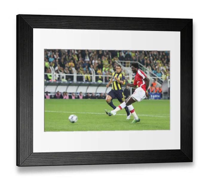 Framed Print : Thrilling Debut: Adebayor Scores First Arsenal Goal in Epic 5-2 Champions League Victory over Fenerbahce