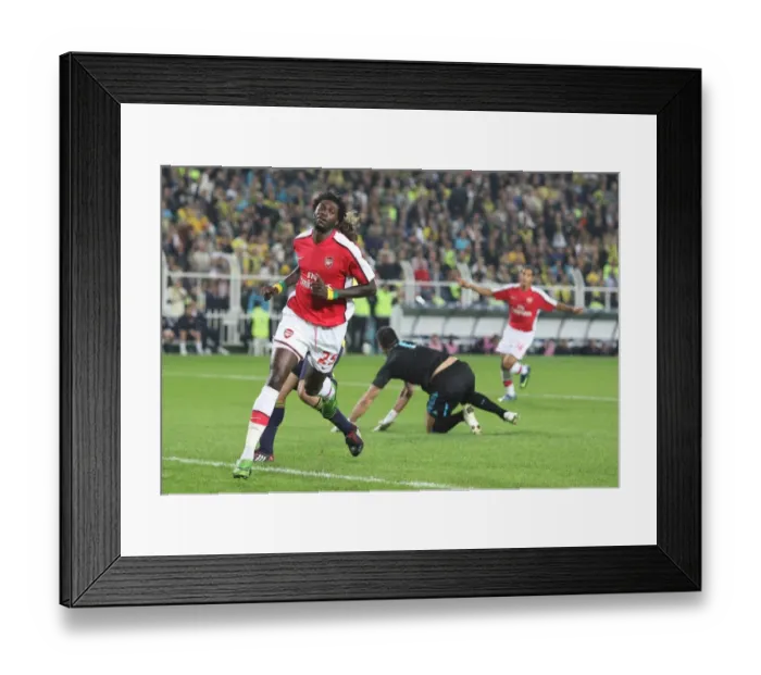 Framed Print : Adebayor's Euphoric Goal: Arsenal Crushes Fenerbahce 5-2 in Champions League Framed Print : Adebayor's Euphoric Goal: Arsenal Crushes Fenerbahce 5-2 in Champions League
