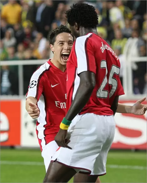 Samir Nasri celebrates with Emmanuel Adebayor (Arsenal)