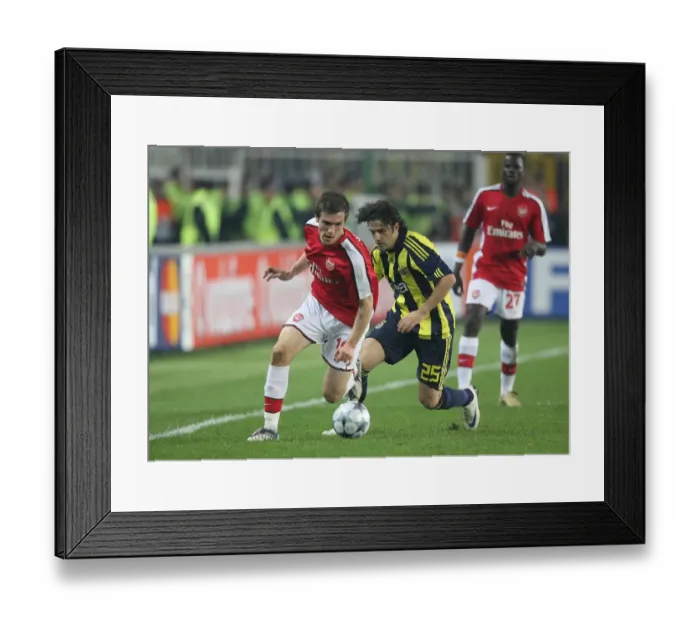 Framed Print : Aaron Ramsey (Arsenal) Ugur Boral (Fenerbahce) Framed Print : Aaron Ramsey (Arsenal) Ugur Boral (Fenerbahce)