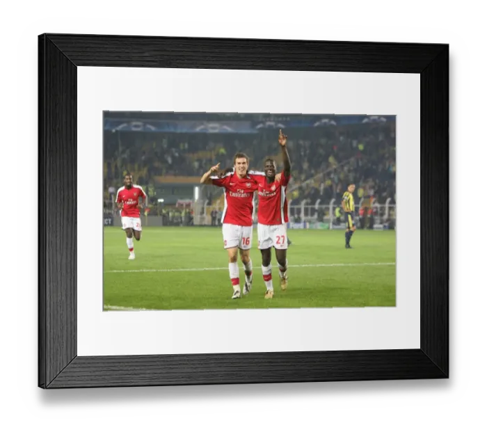 Framed Print : Unforgettable Night: Ramsey's Brace Leads Arsenal to a 5-2 Victory over Fenerbahce in the Champions League
