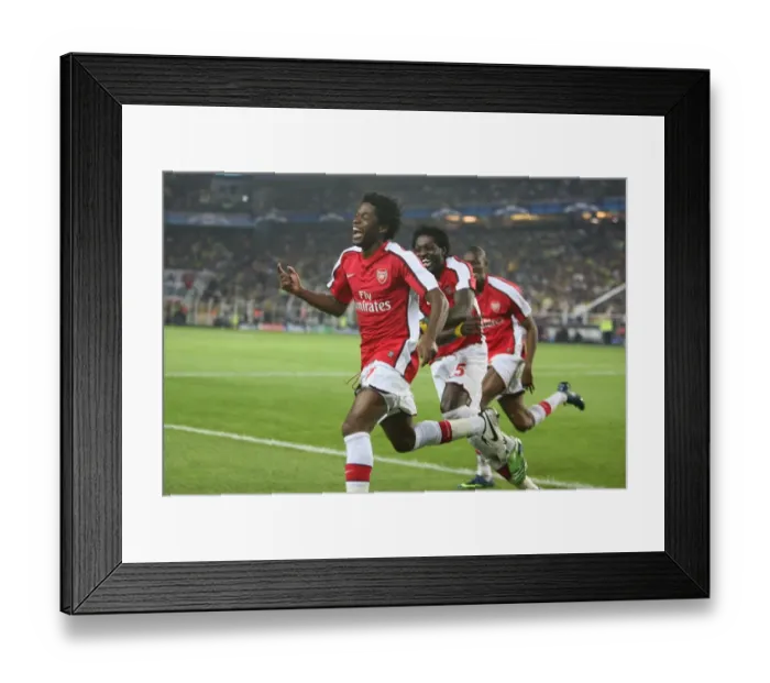 Framed Print : Four Goal Blitz: Song, Adebayor, and Diaby Celebrate Arsenal's Dominant 5-2 Win Over Fenerbahce in the UEFA Champions League
