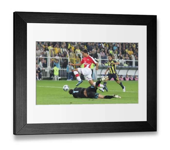 Framed Print : Theo Walcott Scores Arsenal's Second Goal Past Volkan Demirel in UEFA Champions League: Fenerbahce 2-5 Arsenal Framed Print : Theo Walcott Scores Arsenal's Second Goal Past Volkan Demirel in UEFA Champions League: Fenerbahce 2-5 Arsenal