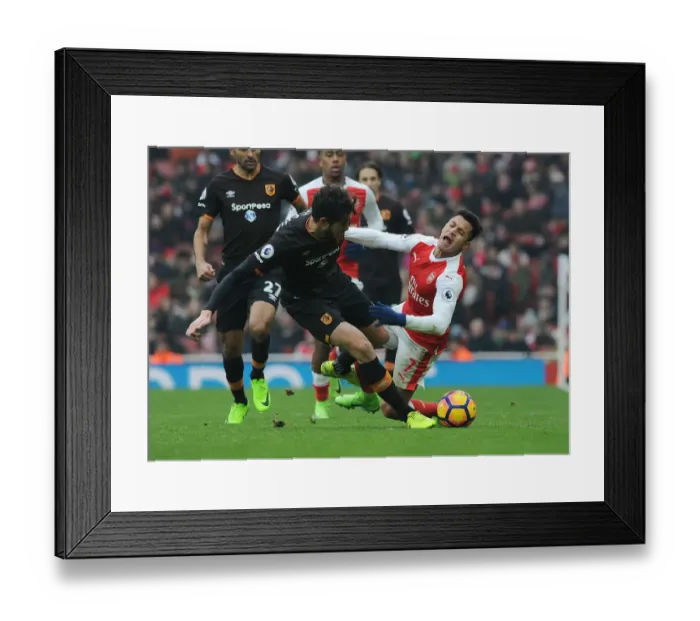 Framed Print : Arsenal vs Hull City: Sanchez Fouls Ranocchia in Intense Premier League Clash Framed Print : Arsenal vs Hull City: Sanchez Fouls Ranocchia in Intense Premier League Clash