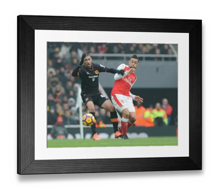 Framed Print : Coquelin vs Evandoro: A Premier League Battle at Emirates Stadium Framed Print : Coquelin vs Evandoro: A Premier League Battle at Emirates Stadium