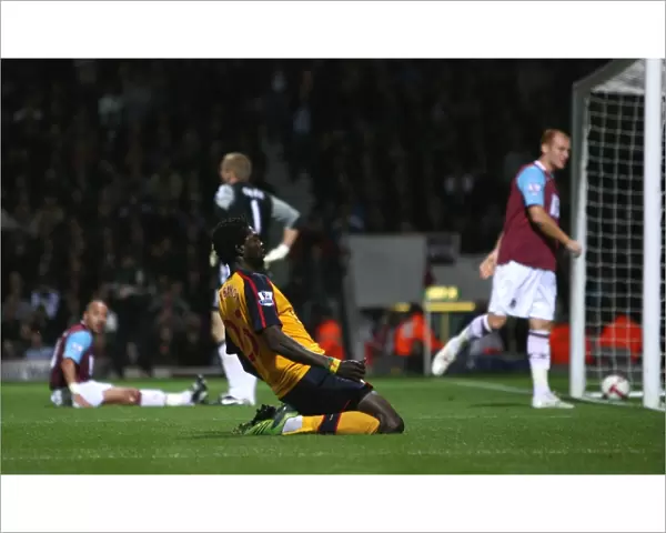 Emmanuel Adebayor celebrates the 1st Arsenal goal
