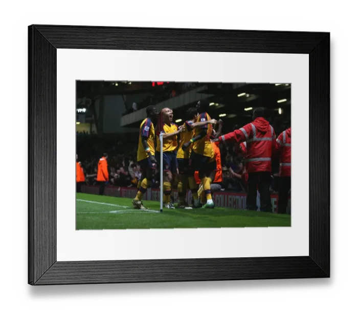 Framed Print : Adebayor's Double: Arsenal's Celebration after 2nd Goal vs. West Ham (Eboue, Silvestre, Fabregas) Framed Print : Adebayor's Double: Arsenal's Celebration after 2nd Goal vs. West Ham (Eboue, Silvestre, Fabregas)