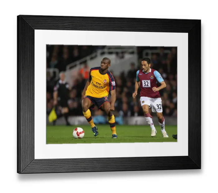 Framed Print : Abu Diaby (Arsenal) David Di Michele (West Ham) Framed Print : Abu Diaby (Arsenal) David Di Michele (West Ham)