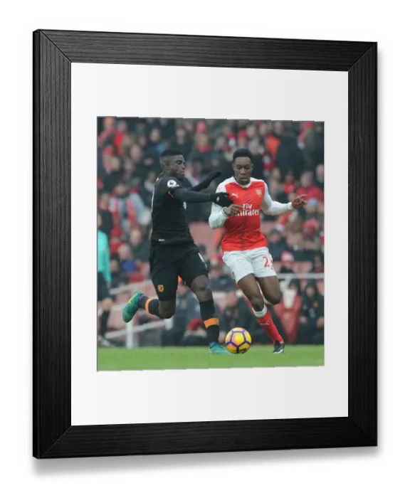 Framed Print : Intense Rivalry: Welbeck vs. Diaye in Arsenal's Battle with Hull City Framed Print : Intense Rivalry: Welbeck vs. Diaye in Arsenal's Battle with Hull City