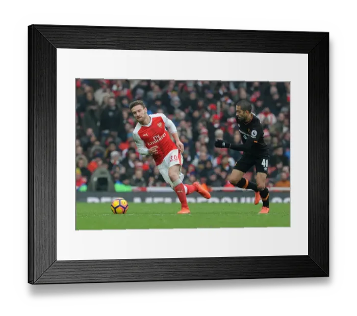 Framed Print : Arsenal vs Hull City: Mustafi Clashes with Evandro in Premier League Showdown Framed Print : Arsenal vs Hull City: Mustafi Clashes with Evandro in Premier League Showdown