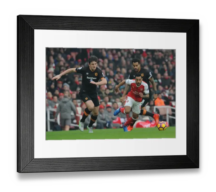 Framed Print : Arsenal's Theo Walcott Clashes with Hull City's Maguire and Huddlestone during Premier League Match