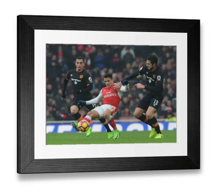 Framed Print : Sanchez vs. Hull Defenders: A Football Battle at the Emirates Framed Print : Sanchez vs. Hull Defenders: A Football Battle at the Emirates