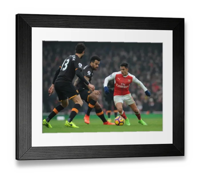 Framed Print : Arsenal's Alexis Sanchez Faces Off Against Hull City Defenders Framed Print : Arsenal's Alexis Sanchez Faces Off Against Hull City Defenders
