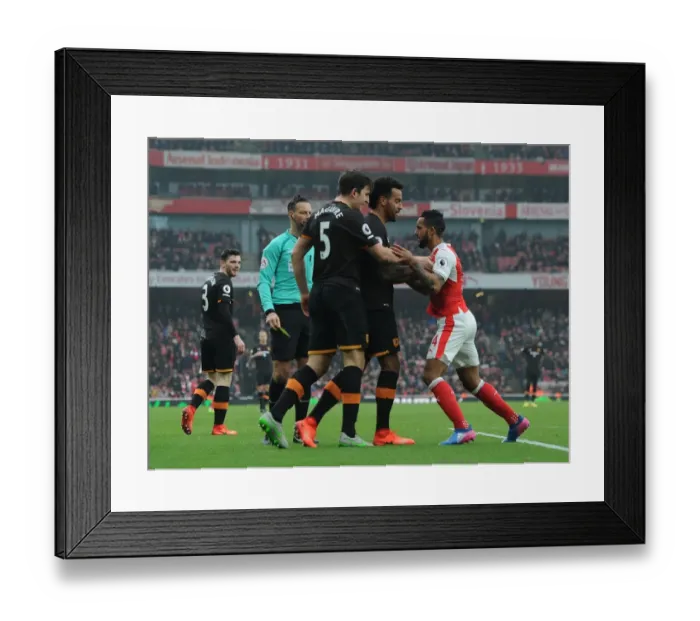 Framed Print : Arsenal's Theo Walcott Stands Firm Against Hull City's Maguire and Huddlestone Framed Print : Arsenal's Theo Walcott Stands Firm Against Hull City's Maguire and Huddlestone