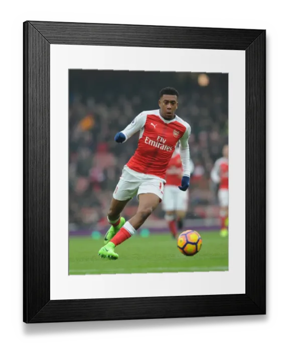 Framed Print : Arsenal's Alex Iwobi in Action against Hull City during 2016-17 Premier League Clash at Emirates Stadium Framed Print : Arsenal's Alex Iwobi in Action against Hull City during 2016-17 Premier League Clash at Emirates Stadium