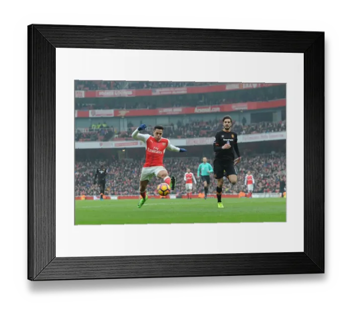 Framed Print : Arsenal's Alexis Sanchez Fends Off Hull's Andrea Ranocchia During Premier League Clash Framed Print : Arsenal's Alexis Sanchez Fends Off Hull's Andrea Ranocchia During Premier League Clash