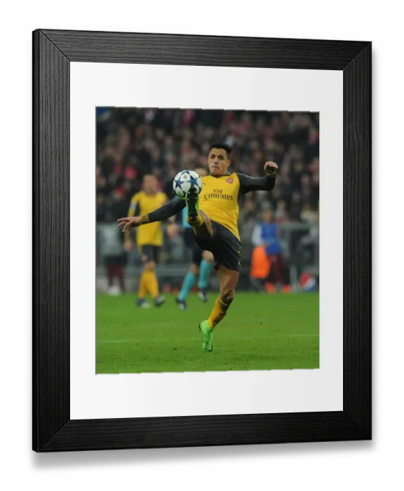 Framed Print : Arsenal's Alexis Sanchez Faces Bayern Munchen in 2016-17 UEFA Champions League Framed Print : Arsenal's Alexis Sanchez Faces Bayern Munchen in 2016-17 UEFA Champions League