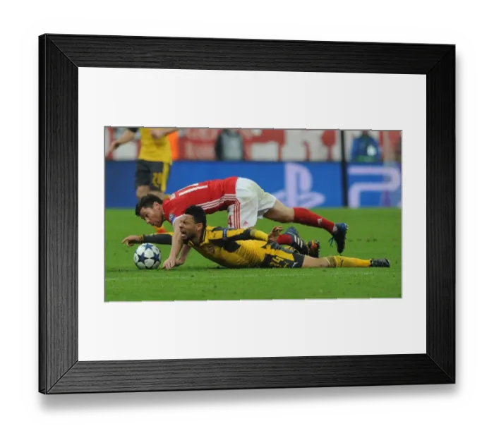 Framed Print : Coquelin Fouls Alonso: Intense Battle in Bayern Munich vs Arsenal UEFA Champions League Clash Framed Print : Coquelin Fouls Alonso: Intense Battle in Bayern Munich vs Arsenal UEFA Champions League Clash