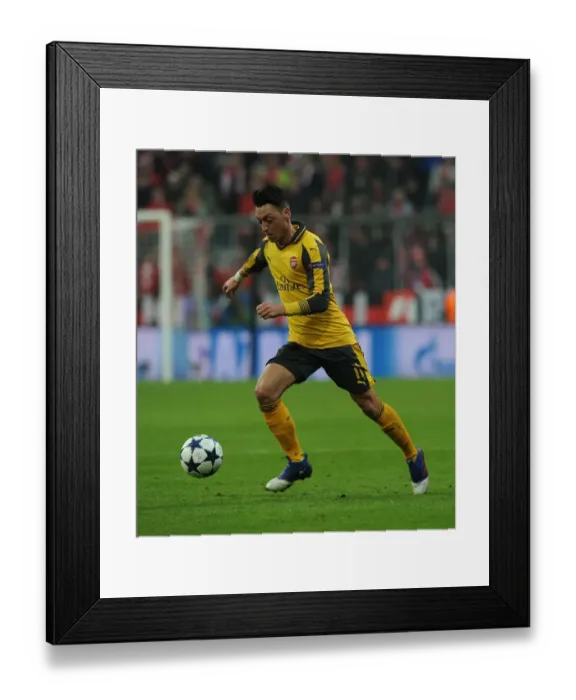 Framed Print : Mesut Ozil in Action: Arsenal vs. Bayern Munich, UEFA Champions League Round of 16 - First Leg Framed Print : Mesut Ozil in Action: Arsenal vs. Bayern Munich, UEFA Champions League Round of 16 - First Leg
