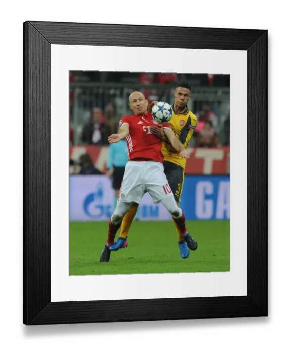 Framed Print : Arsenal vs. Bayern Munich: Kieran Gibbs Faces Arjen Robben in Champions League Showdown