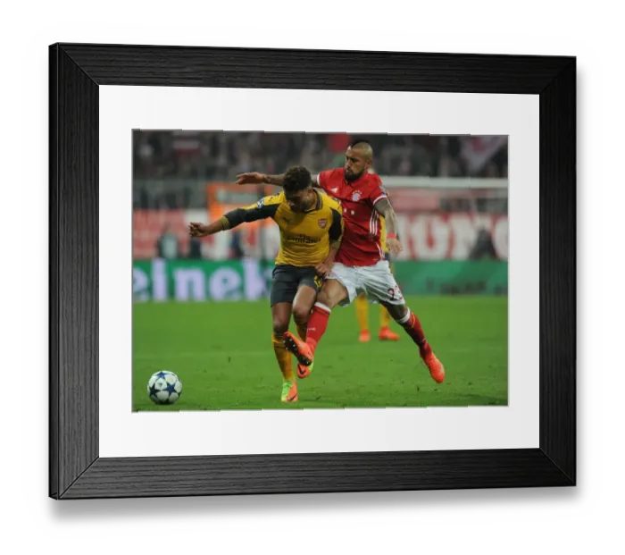 Framed Print : Clash of the Midfield Titans: Oxlade-Chamberlain vs. Vidal - Arsenal vs. Bayern Munich UCL Showdown Framed Print : Clash of the Midfield Titans: Oxlade-Chamberlain vs. Vidal - Arsenal vs. Bayern Munich UCL Showdown