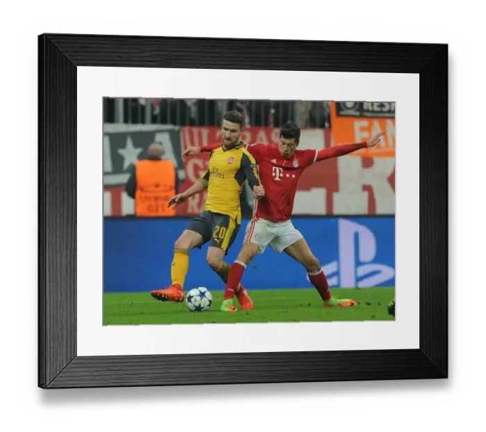 Framed Print : Mustafi Under Pressure: Bayern Munich vs. Arsenal, UEFA Champions League Round of 16 - First Leg