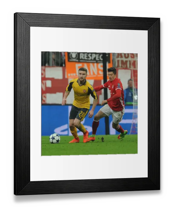 Framed Print : Mustafi Under Pressure: Arsenal vs. Bayern Munich - UEFA Champions League 2016-17 (First Leg) Framed Print : Mustafi Under Pressure: Arsenal vs. Bayern Munich - UEFA Champions League 2016-17 (First Leg)