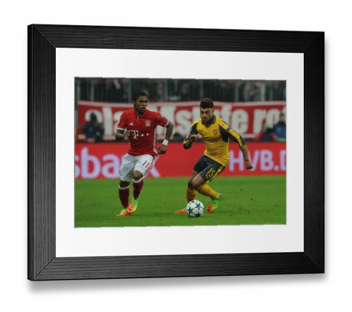 Framed Print : Champions League Showdown: Oxlade-Chamberlain vs. Costa Clash - Bayern Munich vs. Arsenal: A Battle of Wings Framed Print : Champions League Showdown: Oxlade-Chamberlain vs. Costa Clash - Bayern Munich vs. Arsenal: A Battle of Wings