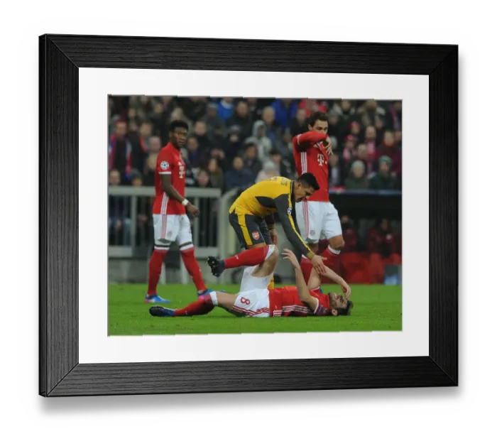 Framed Print : Clash of Titans: Sanchez vs. Martinez - Bayern Munich vs. Arsenal UEFA Champions League Showdown Framed Print : Clash of Titans: Sanchez vs. Martinez - Bayern Munich vs. Arsenal UEFA Champions League Showdown