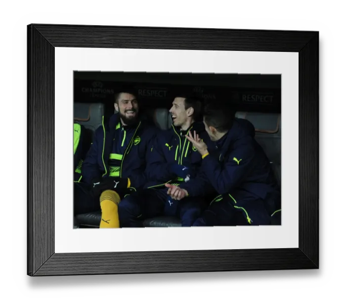 Framed Print : Arsenal Substitutes Gather Before Bayern Munich Clash in Champions League
